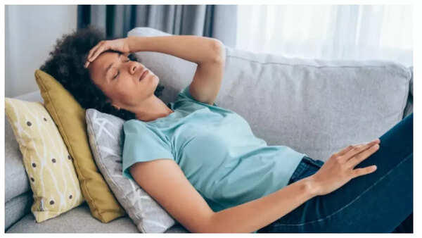 Person feeling tired despite getting enough sleep